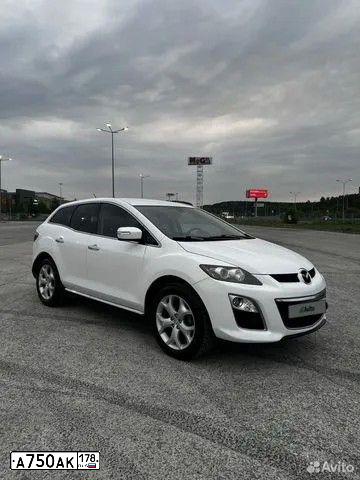 Фото автомобиля MAZDA CX-7, 2010 — госномер О663РХ159. Цвет: Белый