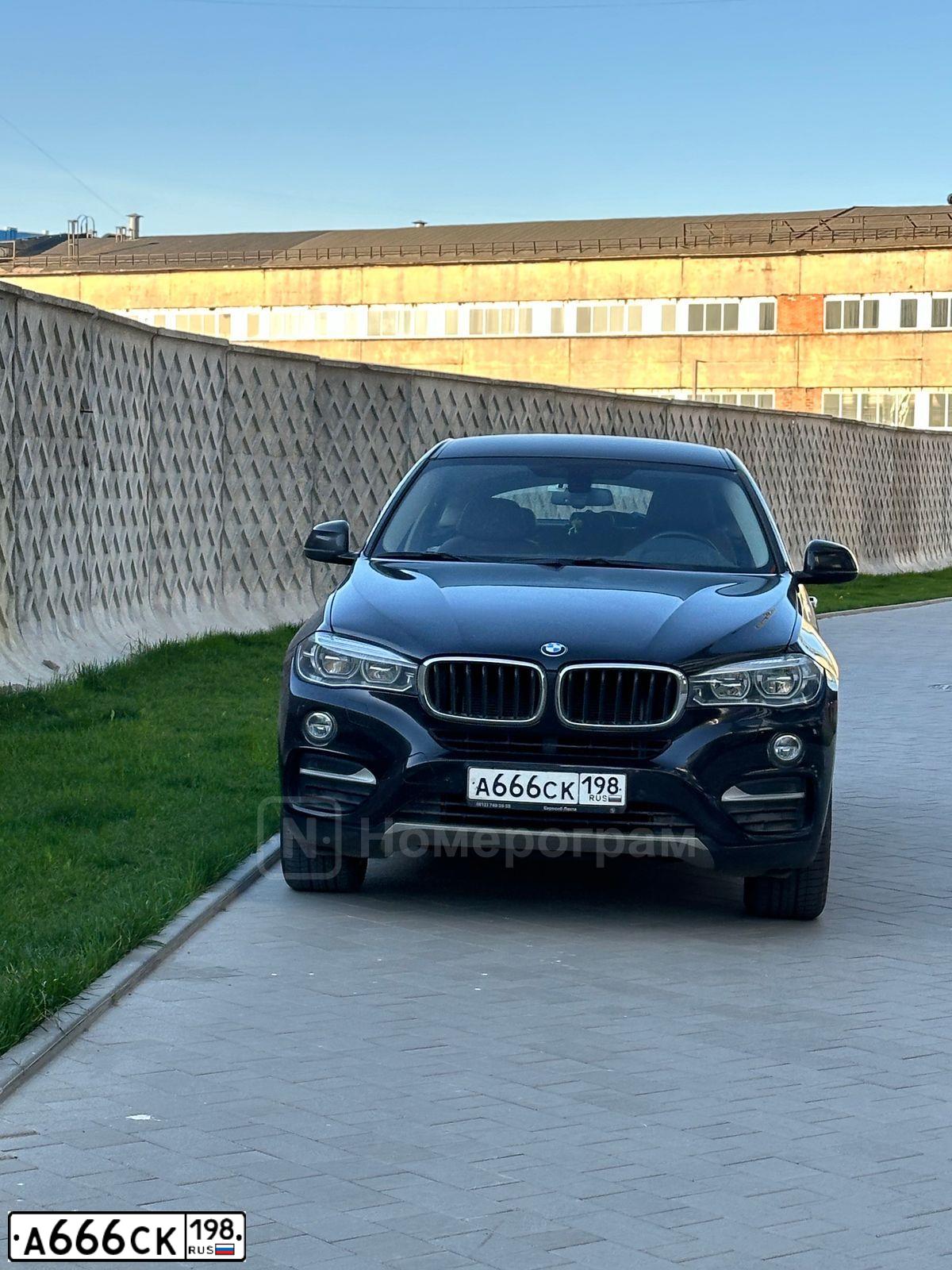 Фото автомобиля BMW X6, 2018 — госномер А666СК198. Цвет: ЧЕРНЫЙ