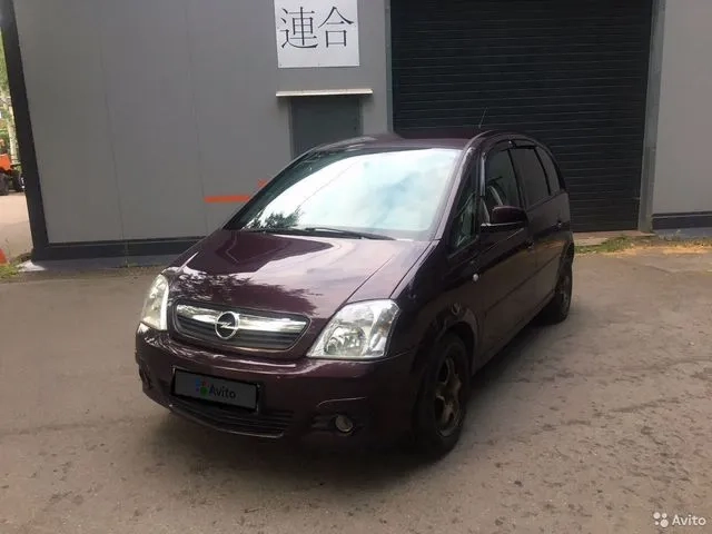 Фото автомобиля OPEL MERIVA, 2006 — госномер А963ЕЕ778. Цвет: ФИОЛЕТОВЫЙ