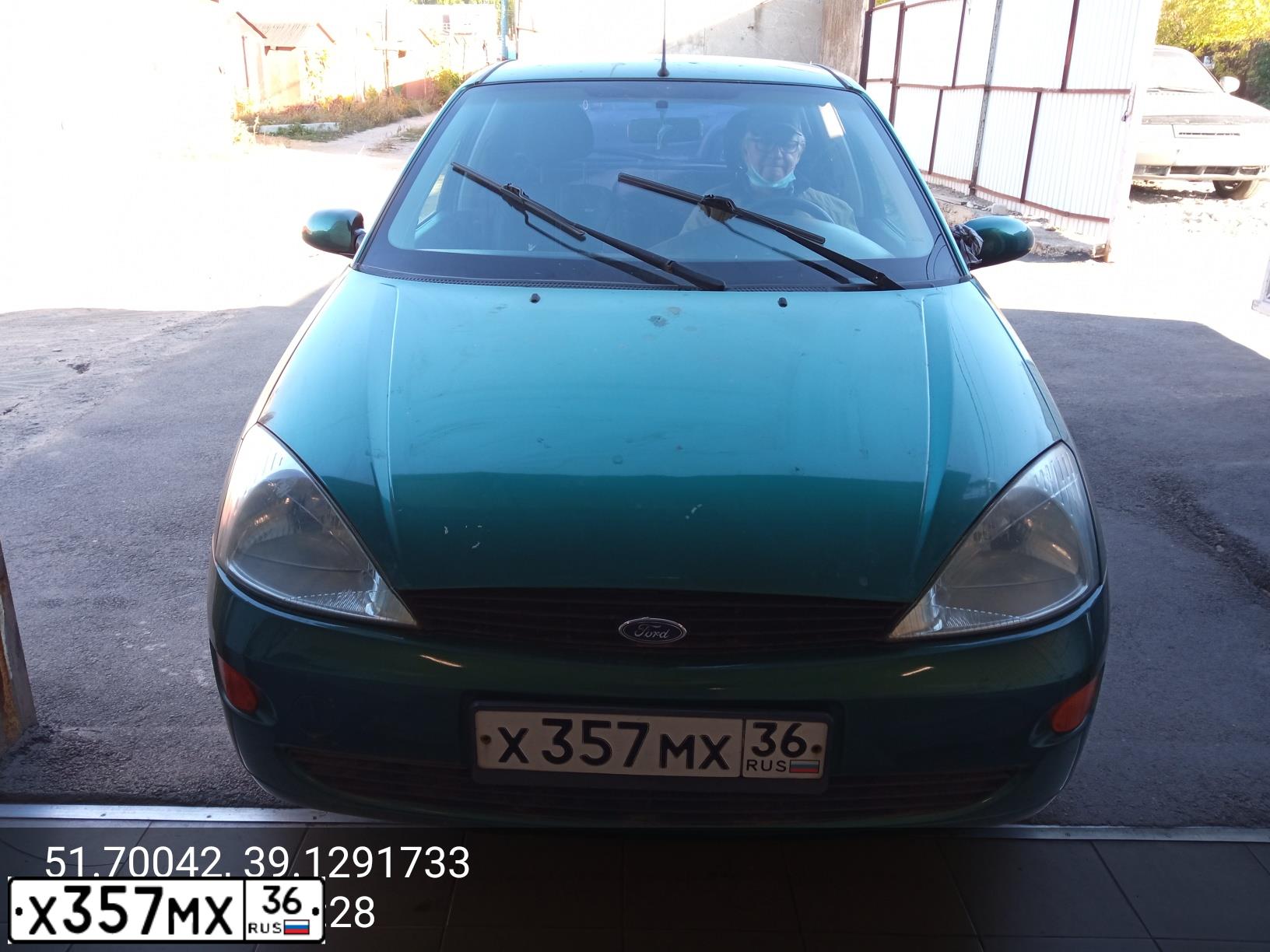 Фото автомобиля FORD FOCUS, 2000 — госномер Х357МХ36. Цвет: ЗЕЛЕНЫЙ