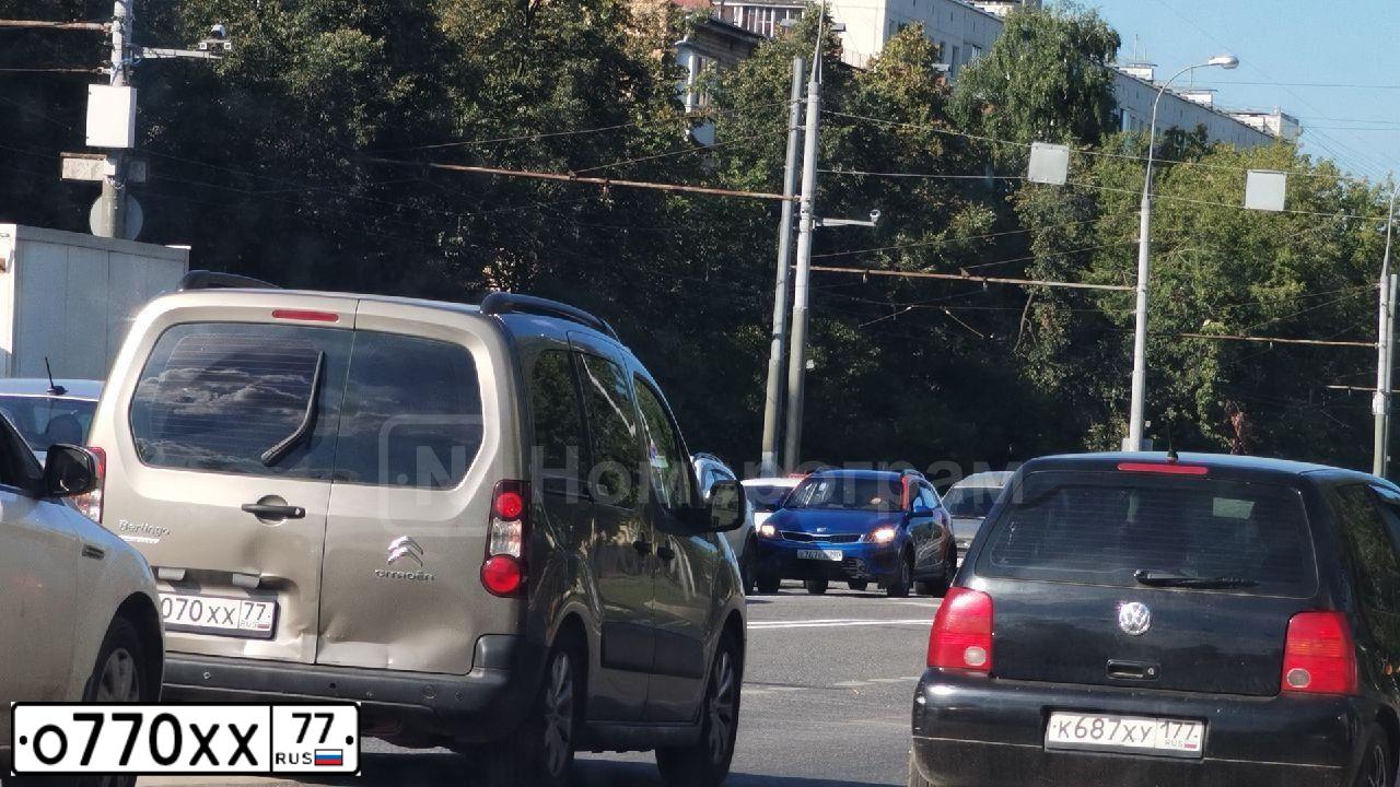 Фото автомобиля LADA 2109 SAMARA, 2000 — госномер О770ХХ77. Цвет: ЧЕРНЫЙ