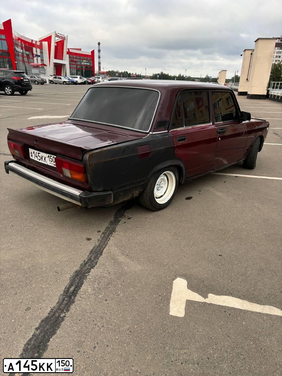 Фото автомобиля LADA 2105 LADA, 2007 — госномер А145КК150. Цвет: ТЕМНО-ВИШНЕВЫЙ