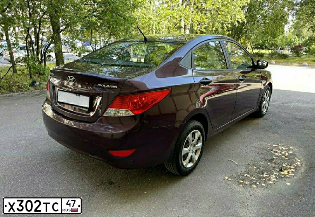 Фото автомобиля HYUNDAI SOLARIS, 2013 — госномер М092МР198. Цвет: ФИОЛЕТОВЫЙ