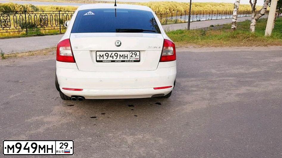 Фото автомобиля SKODA OCTAVIA, 2011 — госномер М949МН29. Цвет: Белый