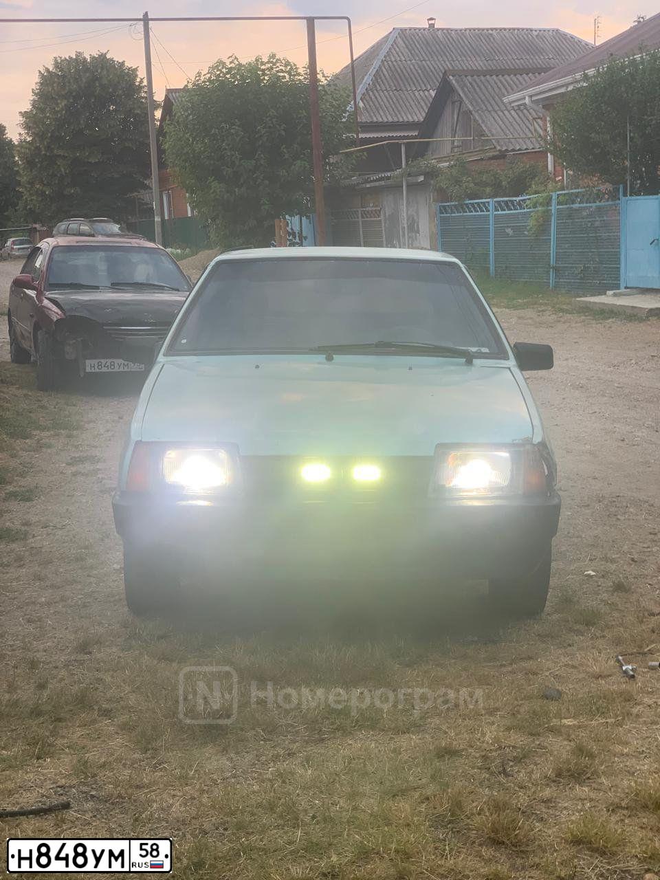 Фото автомобиля LADA 2121 NIVA, 2011 — госномер Р590АВ58. Цвет: ТЕМНО-ЗЕЛЕНЫЙ