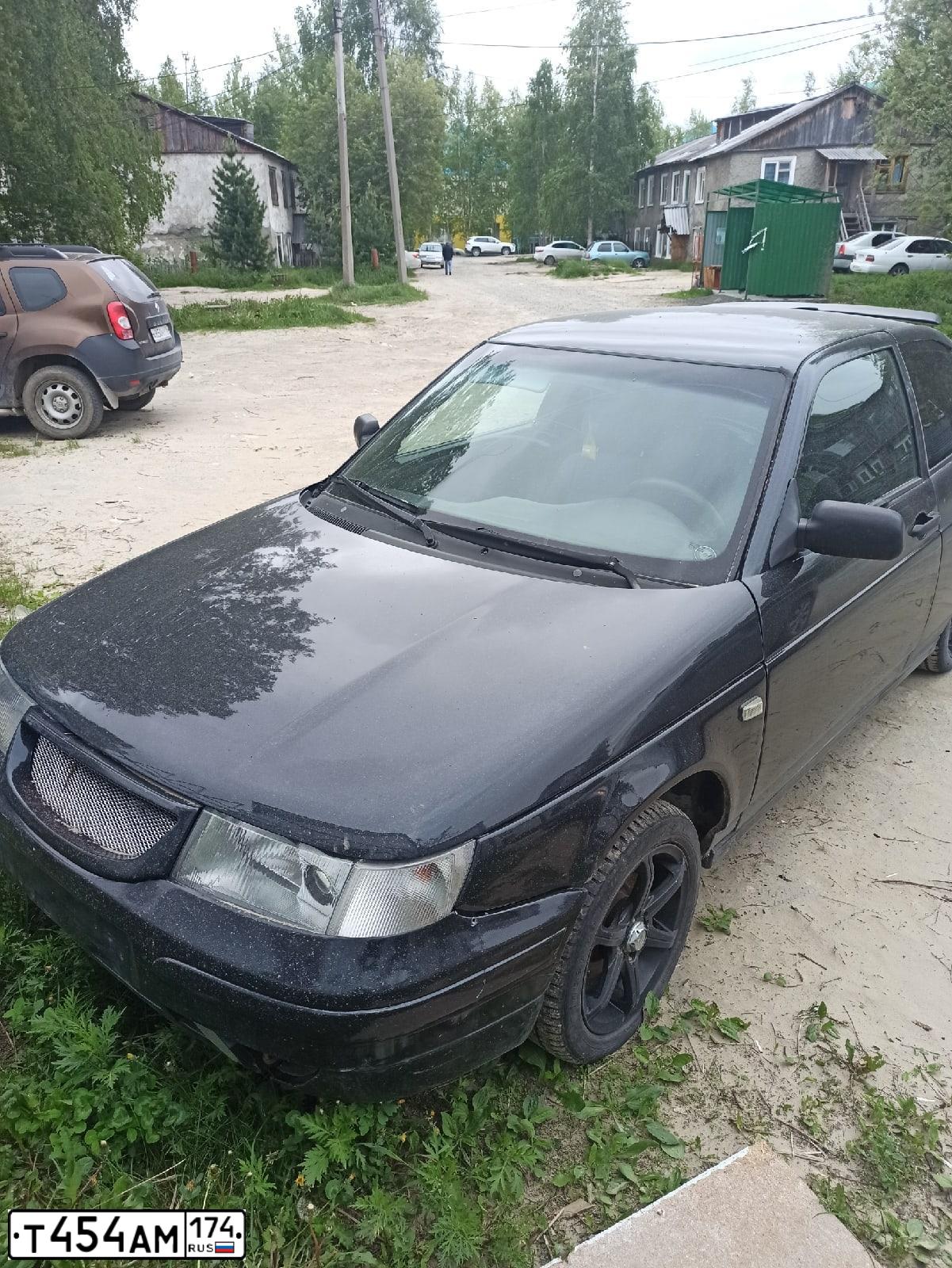 Фото автомобиля LADA 2112, 2007 — госномер Е474ОС186. Цвет: ГРАФИТОВЫЙ МЕТАЛЛИК