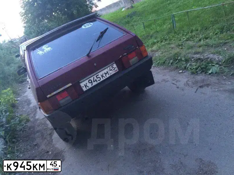 Фото автомобиля LADA 2109 SAMARA, 1997 — госномер К945КМ45. Цвет: БОРДОВЫЙ