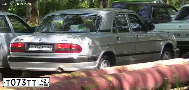Фото автомобиля GAZ 3110 WOLGA, 2002 — госномер Т073ТТ42. Цвет: БУРАН