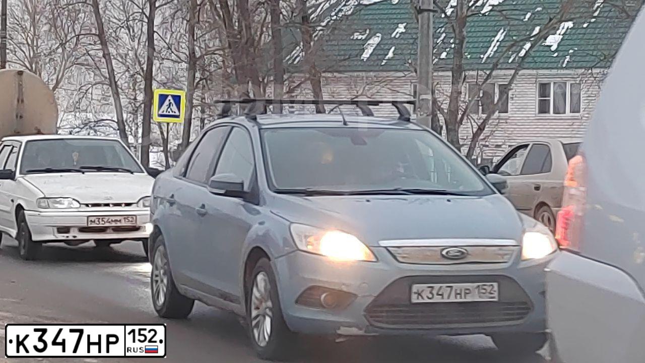Фото автомобиля FORD FOCUS, 2008 — госномер К347НР152. Цвет: СЕРО-ГОЛУБОЙ