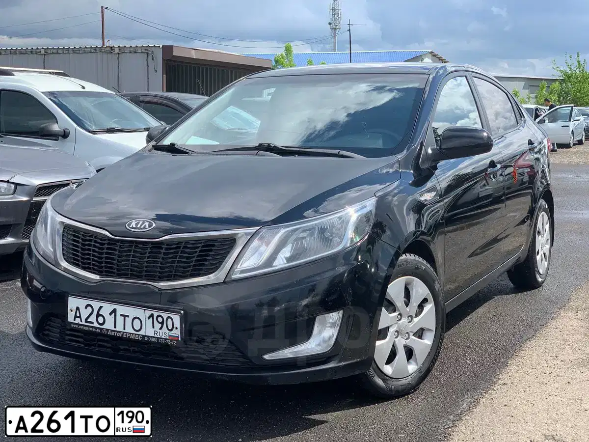 Фото автомобиля KIA RIO, 2012 — госномер М146УС18. Цвет: ЧЕРНЫЙ