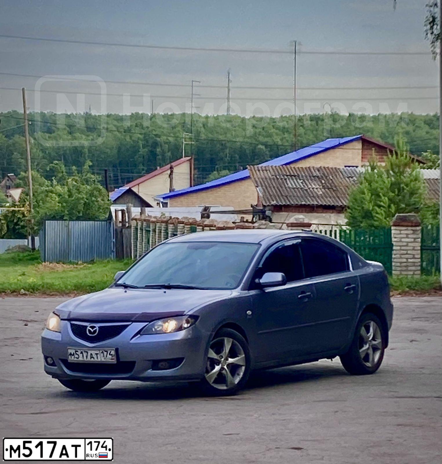 Фото автомобиля MAZDA 3, 2005 — госномер М517АТ174. Цвет: ТЕМНО-СЕРЫЙ
