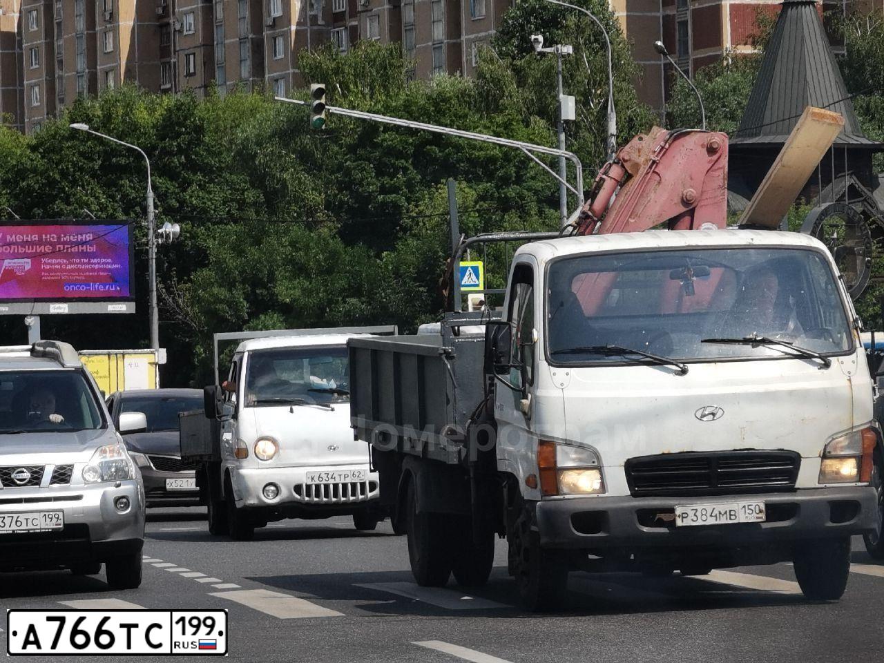 Фото автомобиля MAZDA 3, 2006 — госномер В882КУ92. Цвет: ЧЕРНЫЙ
