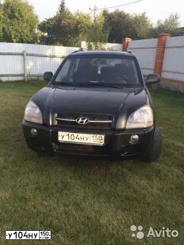 Фото автомобиля HYUNDAI TUCSON, 2007 — госномер Н653УС32. Цвет: ЧЕРНЫЙ