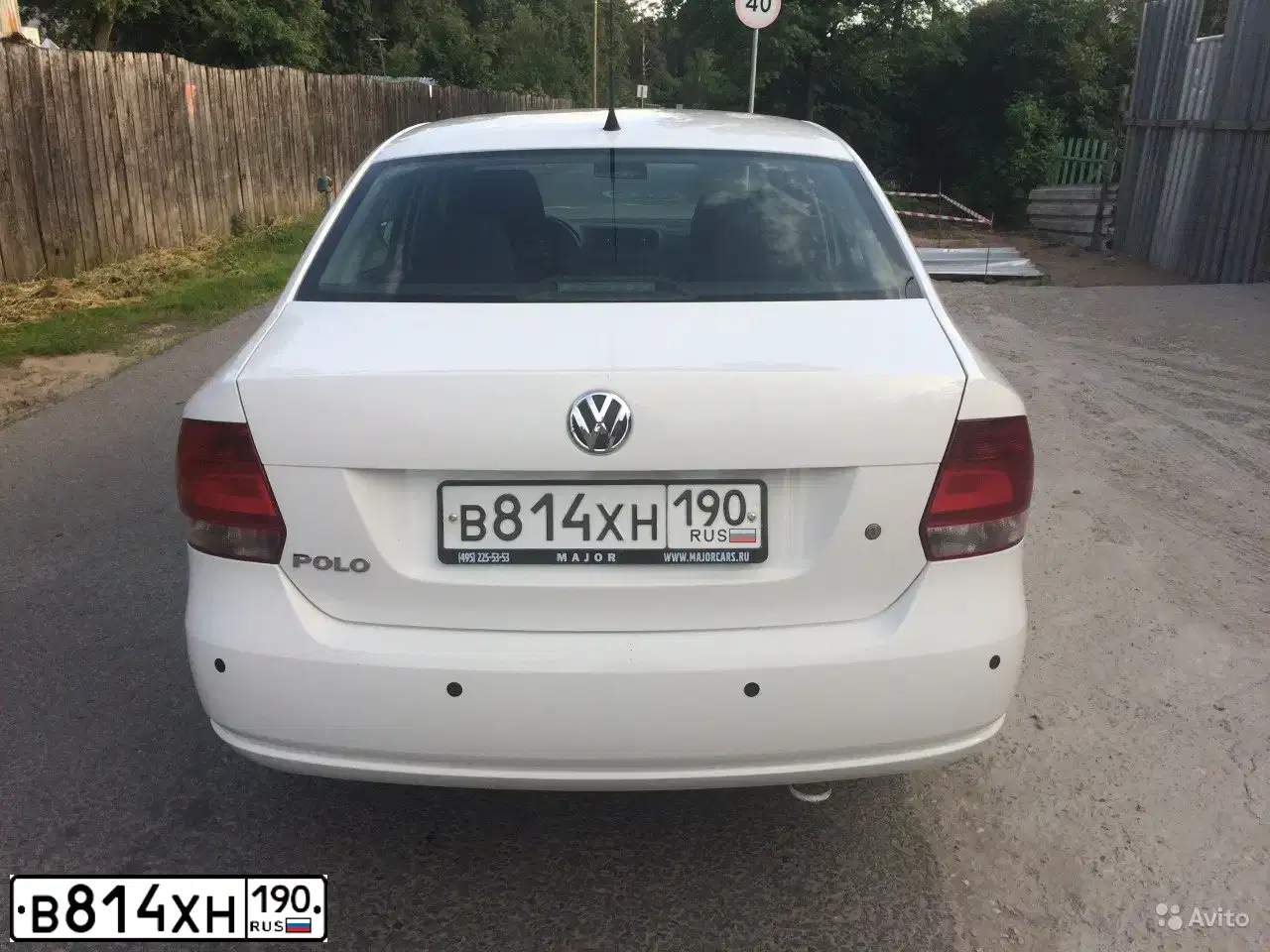 Фото автомобиля VOLKSWAGEN POLO, 2012 — госномер Н203УО702. Цвет: Белый