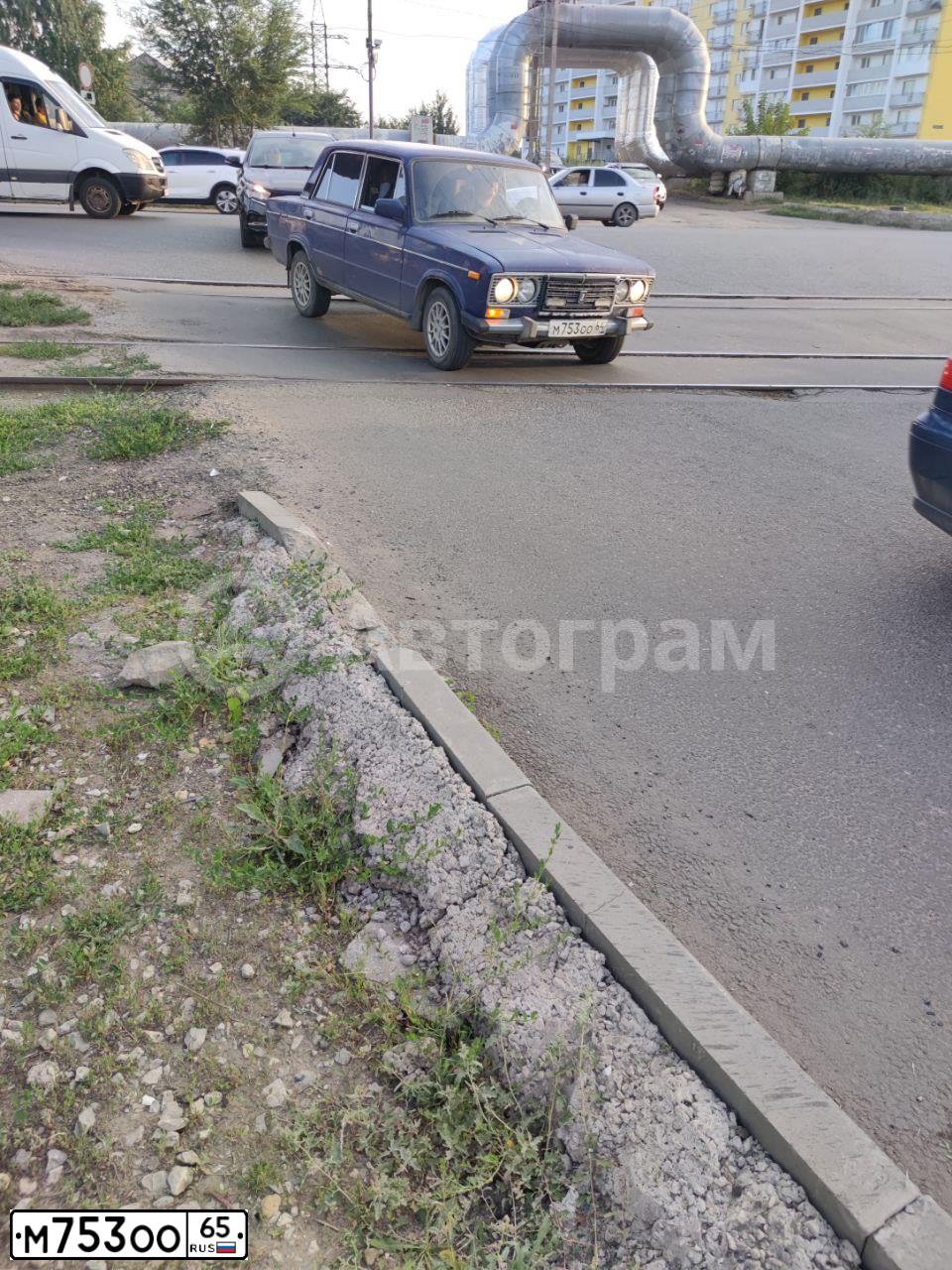 Фото автомобиля HONDA FIT, 2002 — госномер Н424ОХ65