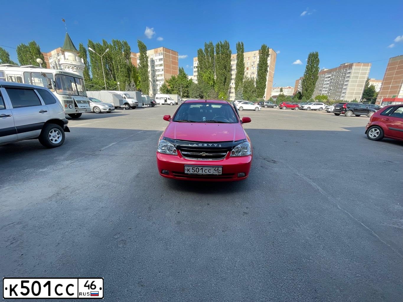 Фото автомобиля CHEVROLET LACETTI, 2009 — госномер К501СС46. Цвет: Красный