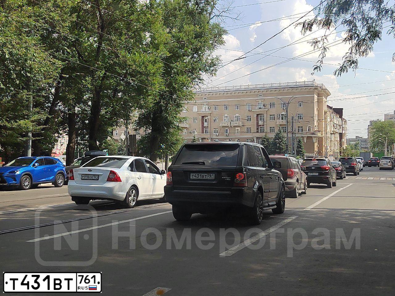 Фото автомобиля LANDROVER RANGE ROVER SPORT, 2009 — госномер К911АЕ190. Цвет: ЧЕРНЫЙ