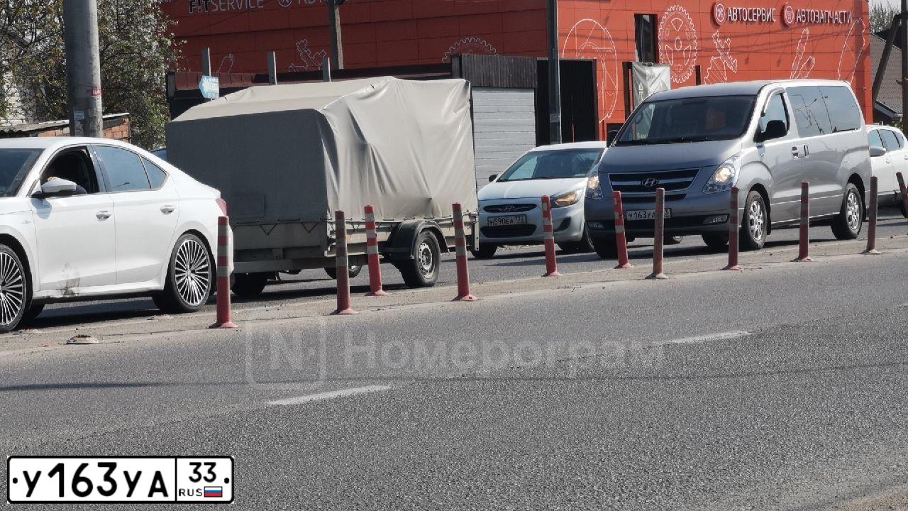Фото автомобиля HYUNDAI ELANTRA, 2012 — госномер У163УА33. Цвет: синий
