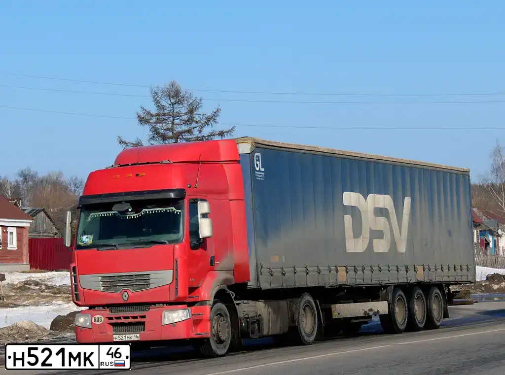 Фото автомобиля RENAULT PREMIUM, 2010 — госномер Х004МК67. Цвет: Красный