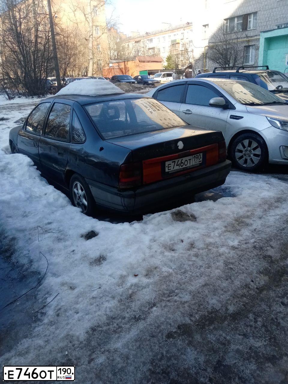 Фото автомобиля OPEL VECTRA, 1991 — госномер Е746ОТ190. Цвет: ЧЕРНЫЙ