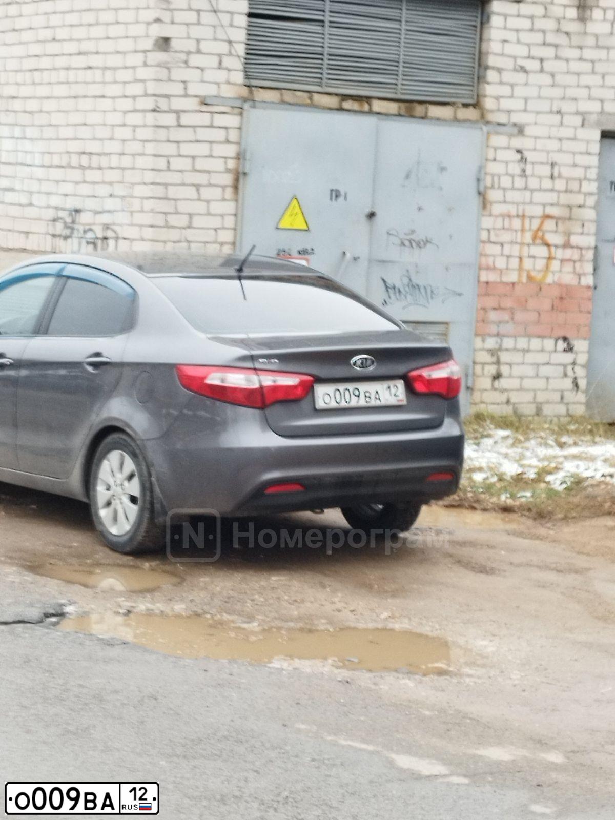 Фото автомобиля KIA RIO, 2011 — госномер О009ВА12. Цвет: Серый