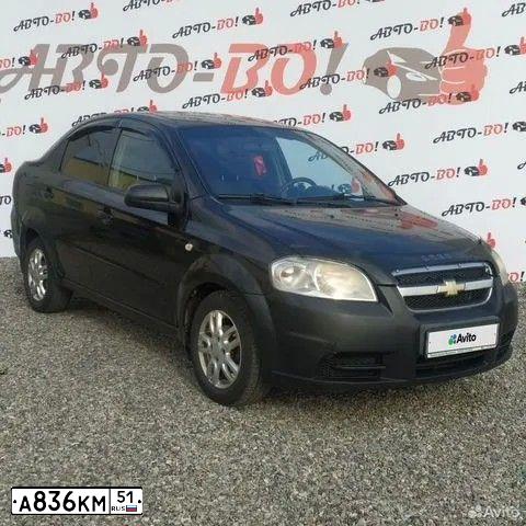 Фото автомобиля MITSUBISHI LANCER, 2008 — госномер Т083МВ51. Цвет: КРАСНЫЙ