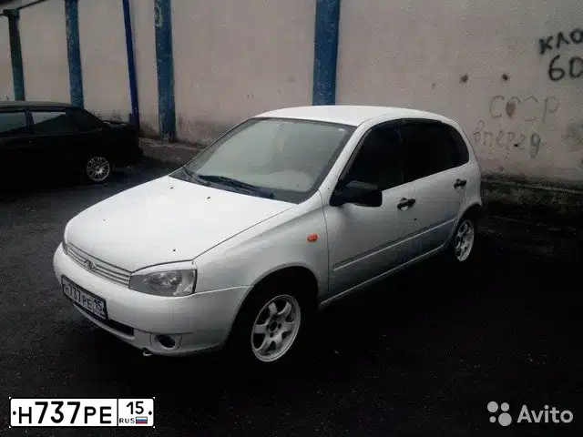 Фото автомобиля LADA 1119 KALINA, 2010 — госномер Н737РЕ15. Цвет: Белый