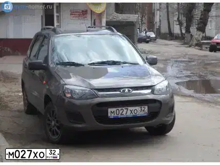 Фото автомобиля LADA 2194 KALINA, 2014 — госномер М027ХО32. Цвет: Золотисто-коричневый