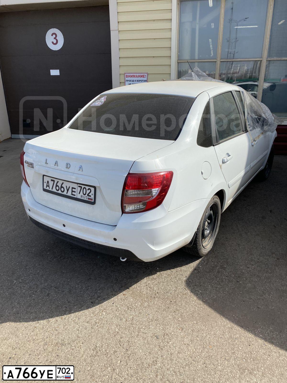 Фото автомобиля LADA 2190 GRANTA, 2020 — госномер А766УЕ702. Цвет: Белый