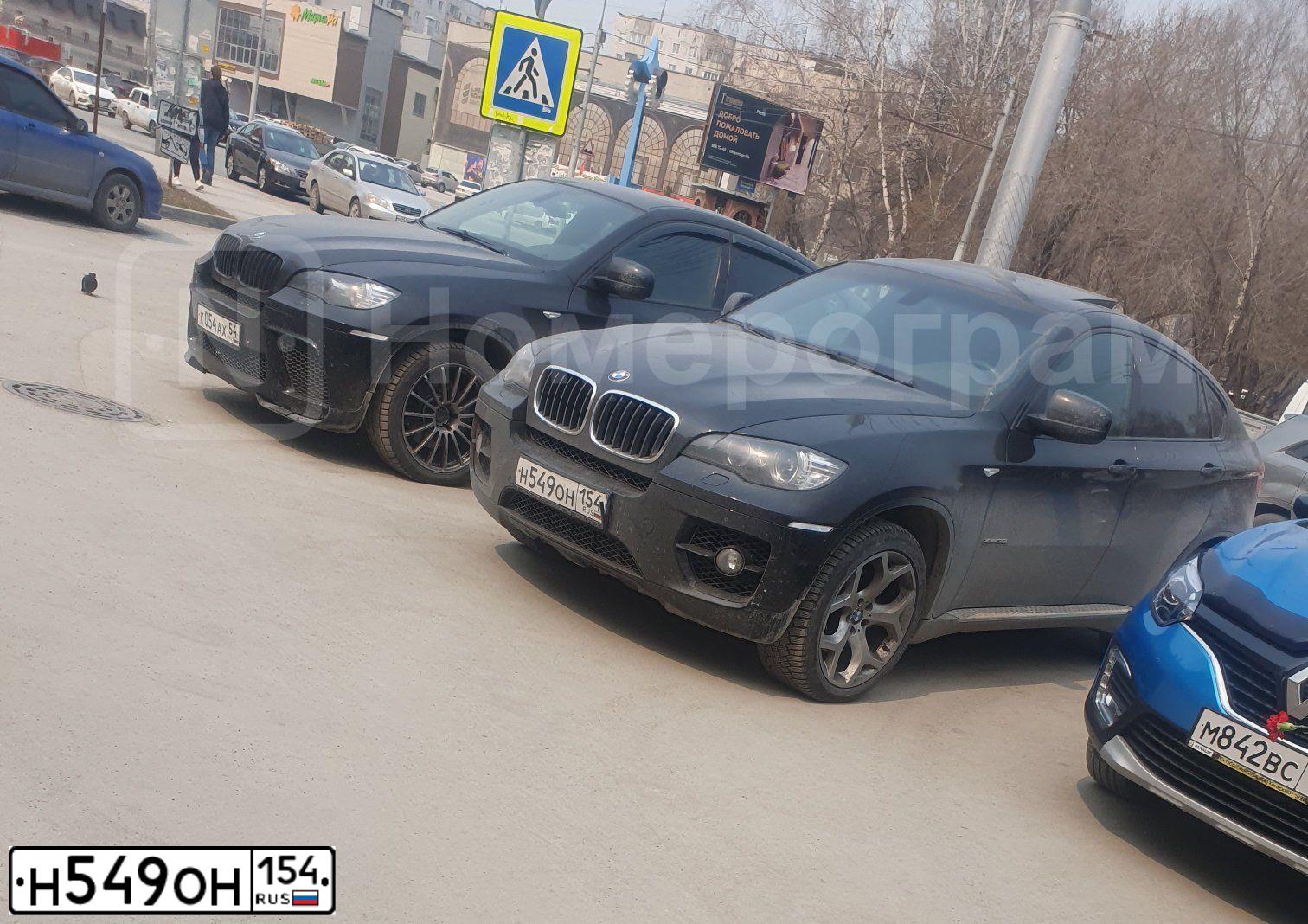 Фото автомобиля BMW X6, 2009 — госномер Т001ТТ154. Цвет: ЧЕРНЫЙ