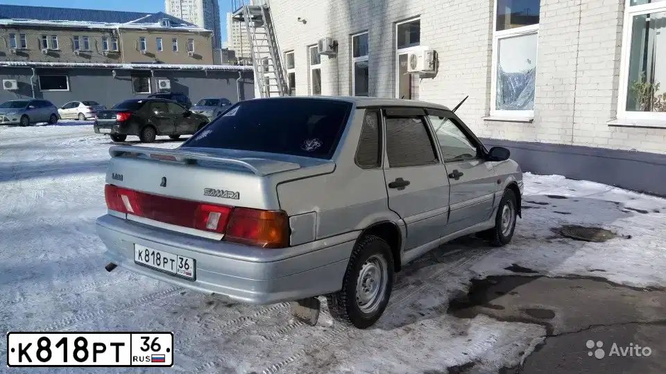 Фото автомобиля LADA 2115 SAMARA, 2007 — госномер Т505АС136. Цвет: Серебристо-желто-голубой