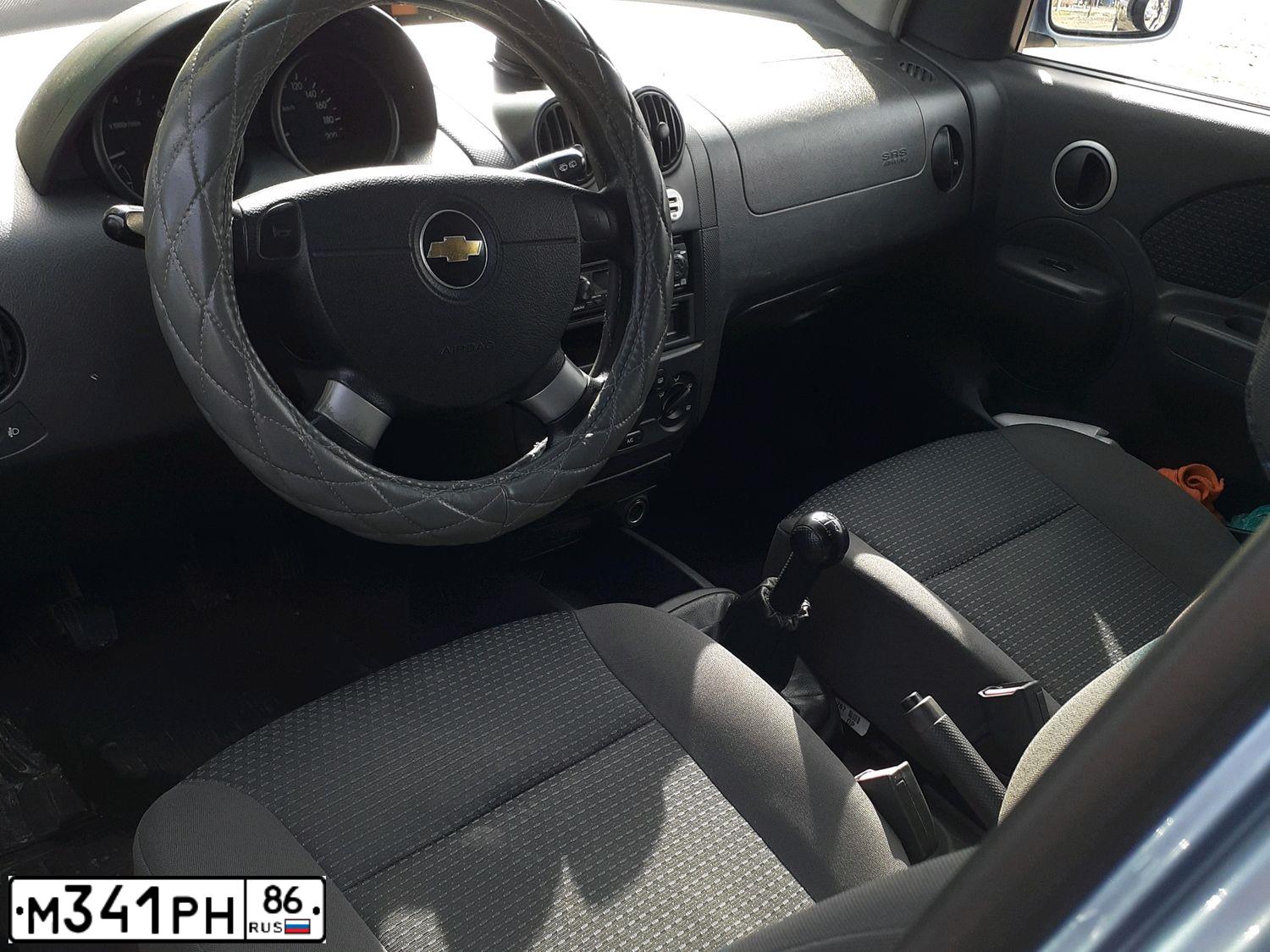 Фото автомобиля CHEVROLET AVEO, 2007 — госномер М341РН86. Цвет: голубой