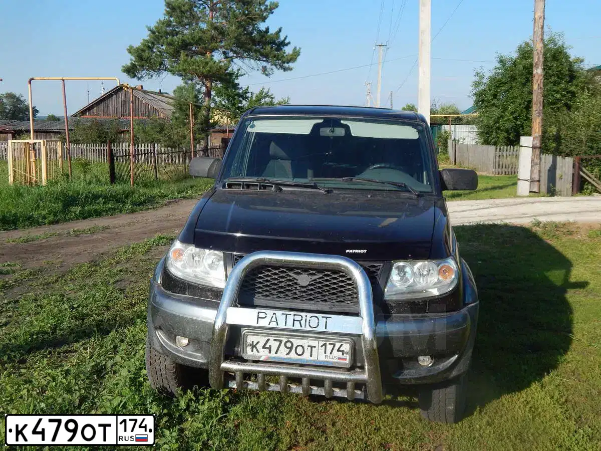 Фото автомобиля UAZ 3163 PATRIOT, 2007 — госномер К479ОТ174. Цвет: ЧЕРНЫЙ