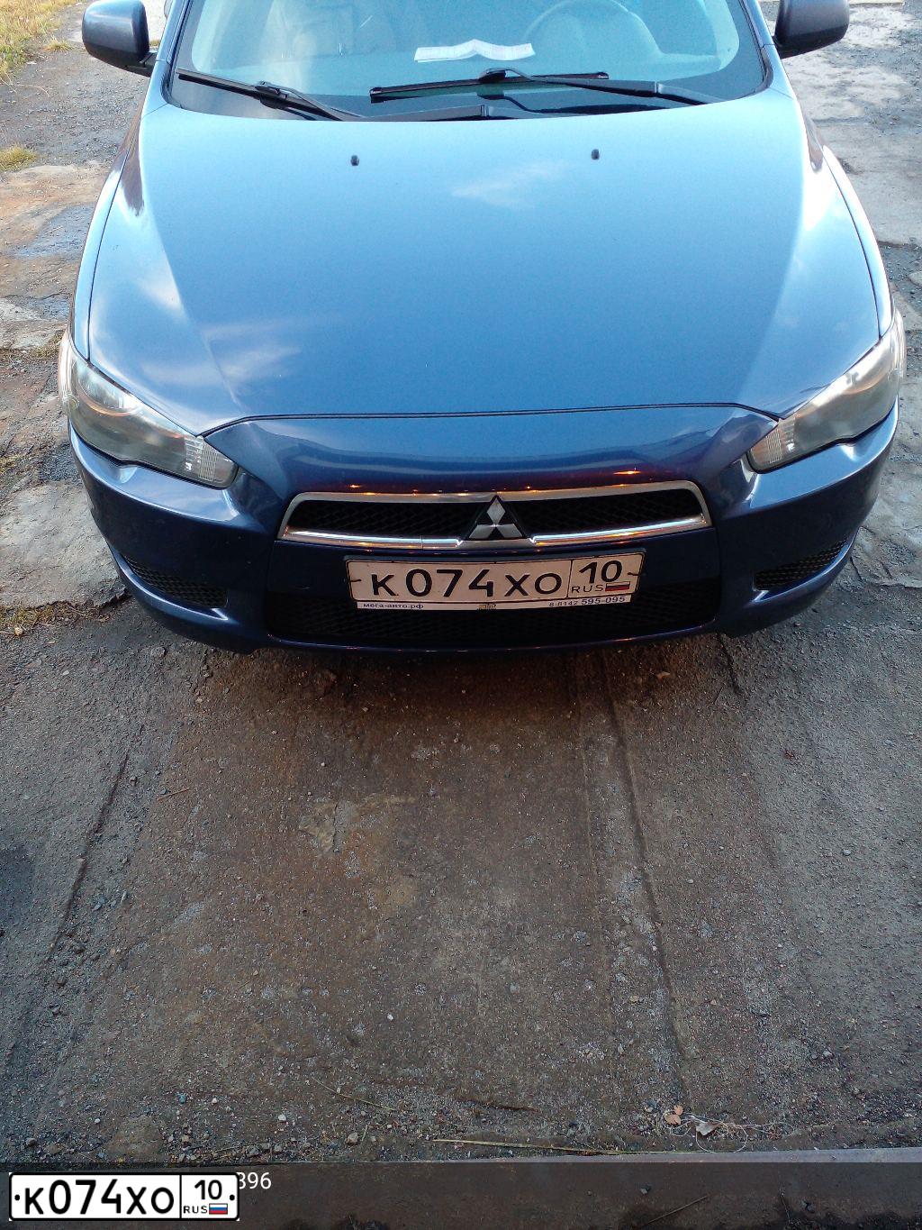 Фото автомобиля MITSUBISHI LANCER, 2008 — госномер К074ХО10. Цвет: СИНИЙ