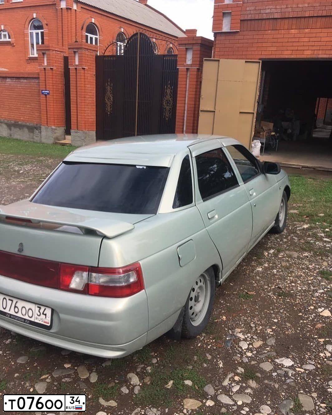 Фото автомобиля LADA 2110, 2002 — госномер Т076ОО34. Цвет: СЕРЕБРИСТ ЖЕЛТО-ЗЕЛЕНЫЙ