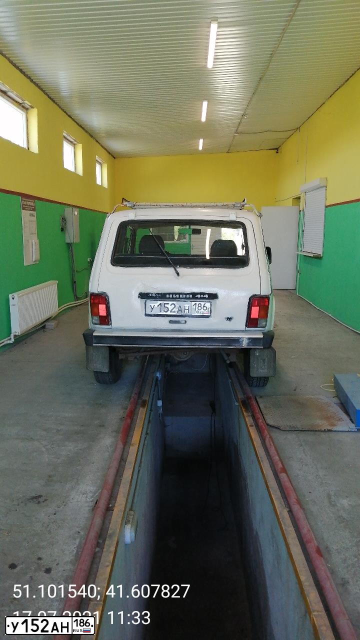 Фото автомобиля LADA 2110, 2006 — госномер Е827РМ761. Цвет: Темно-зеленый