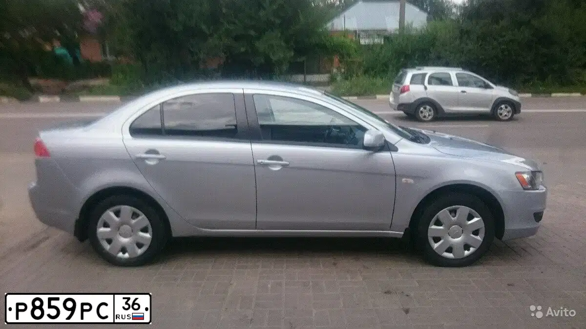 Фото автомобиля MITSUBISHI LANCER, 2008 — госномер М294НЕ136
