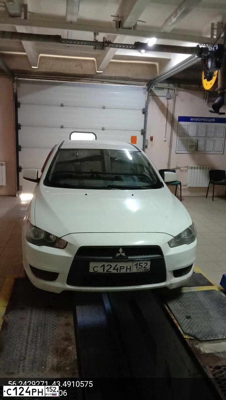 Фото автомобиля MITSUBISHI LANCER, 2008 — госномер Х311РХ52. Цвет: Белый