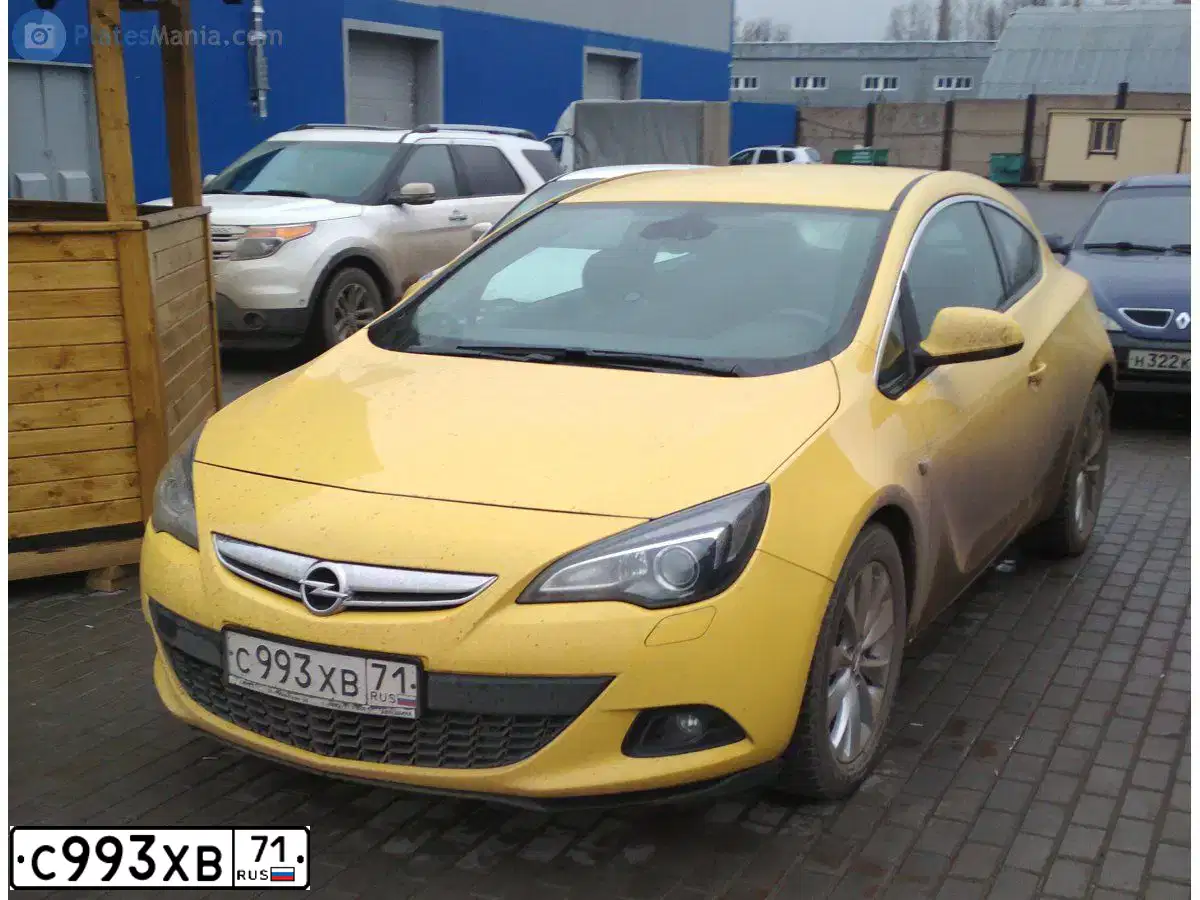 Фото автомобиля OPEL ASTRA, 2012 — госномер М465ЕН35. Цвет: ЖЕЛТЫЙ