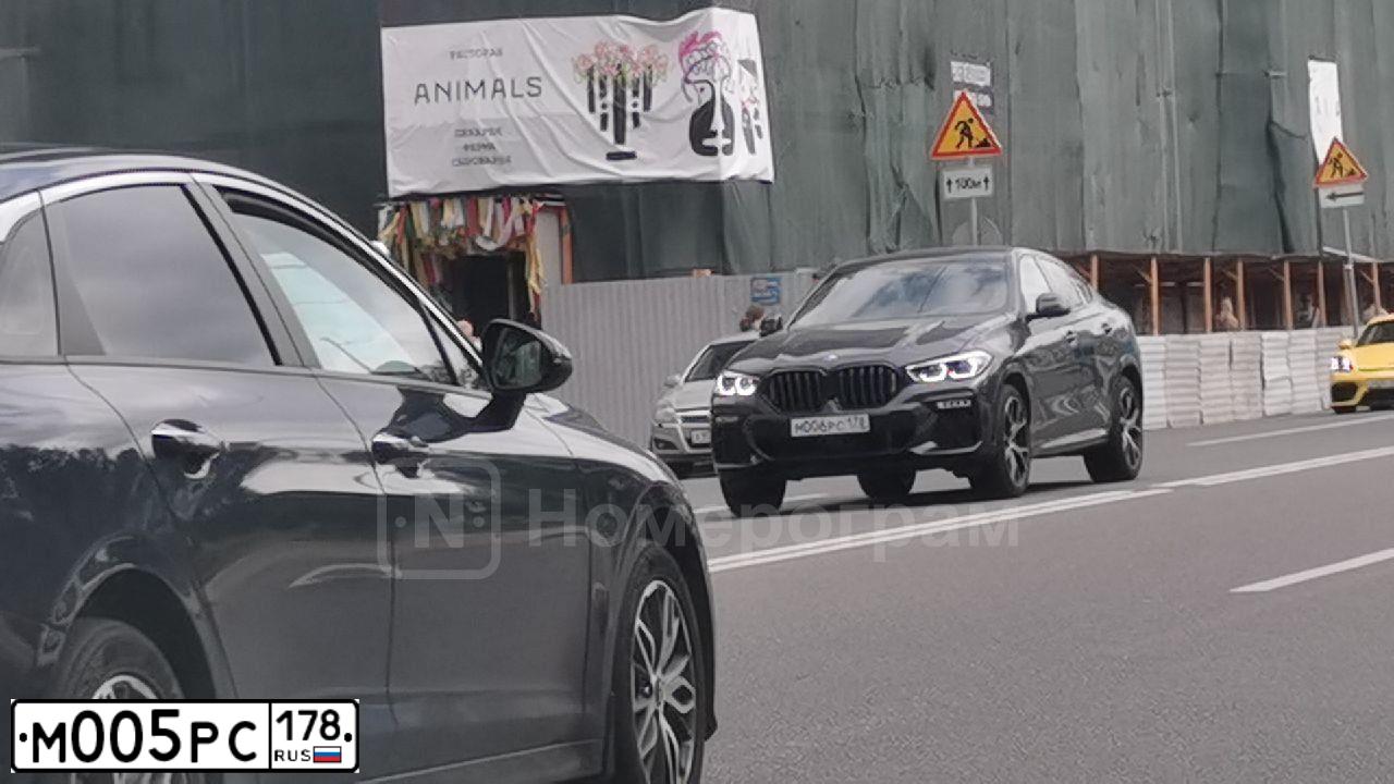 Фото автомобиля AUDI Q5, 2010 — госномер О008ОХ98. Цвет: синий