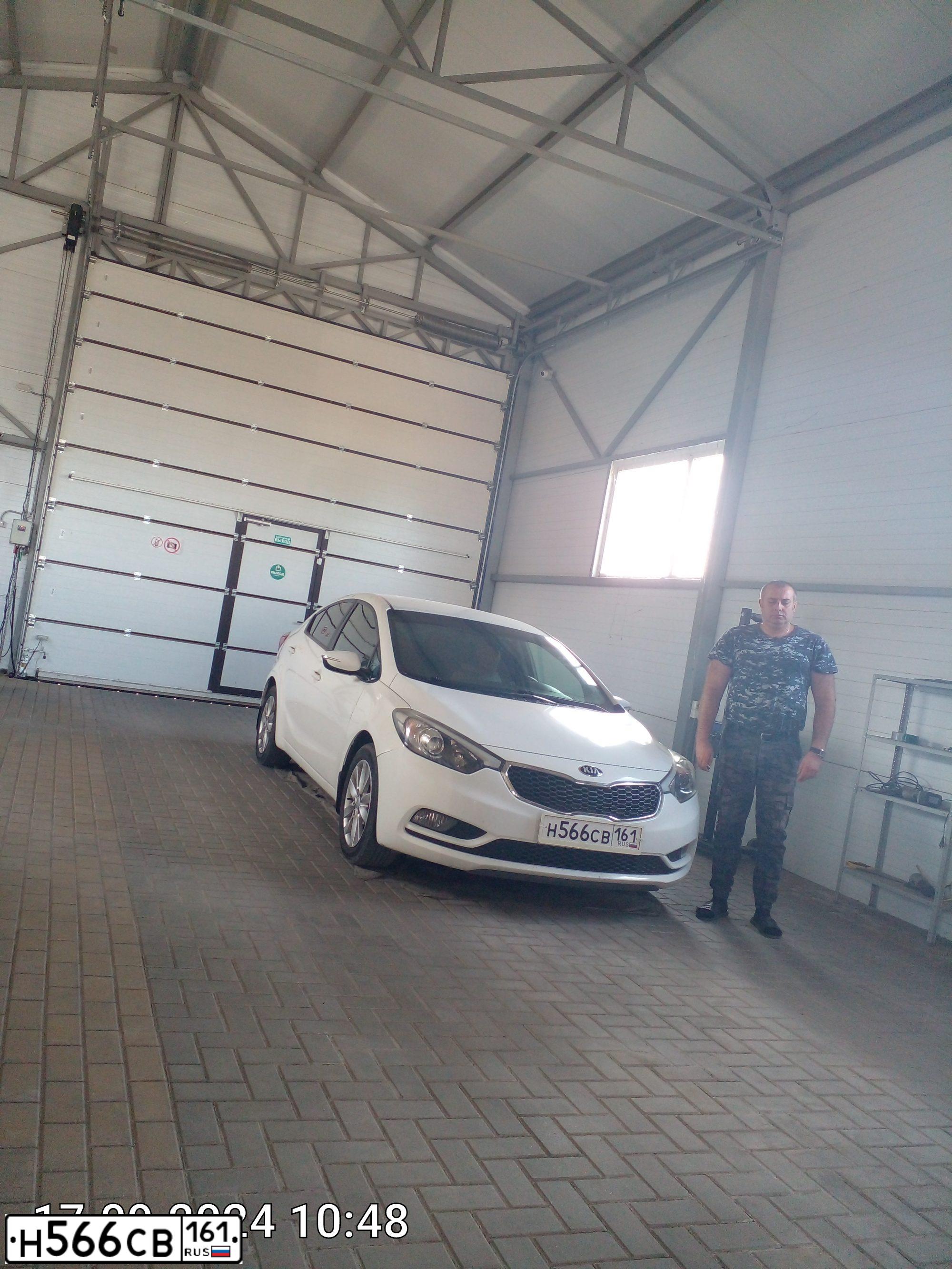 Фото автомобиля KIA CERATO, 2014 — госномер Н566СВ161. Цвет: БЕЛЫЙ