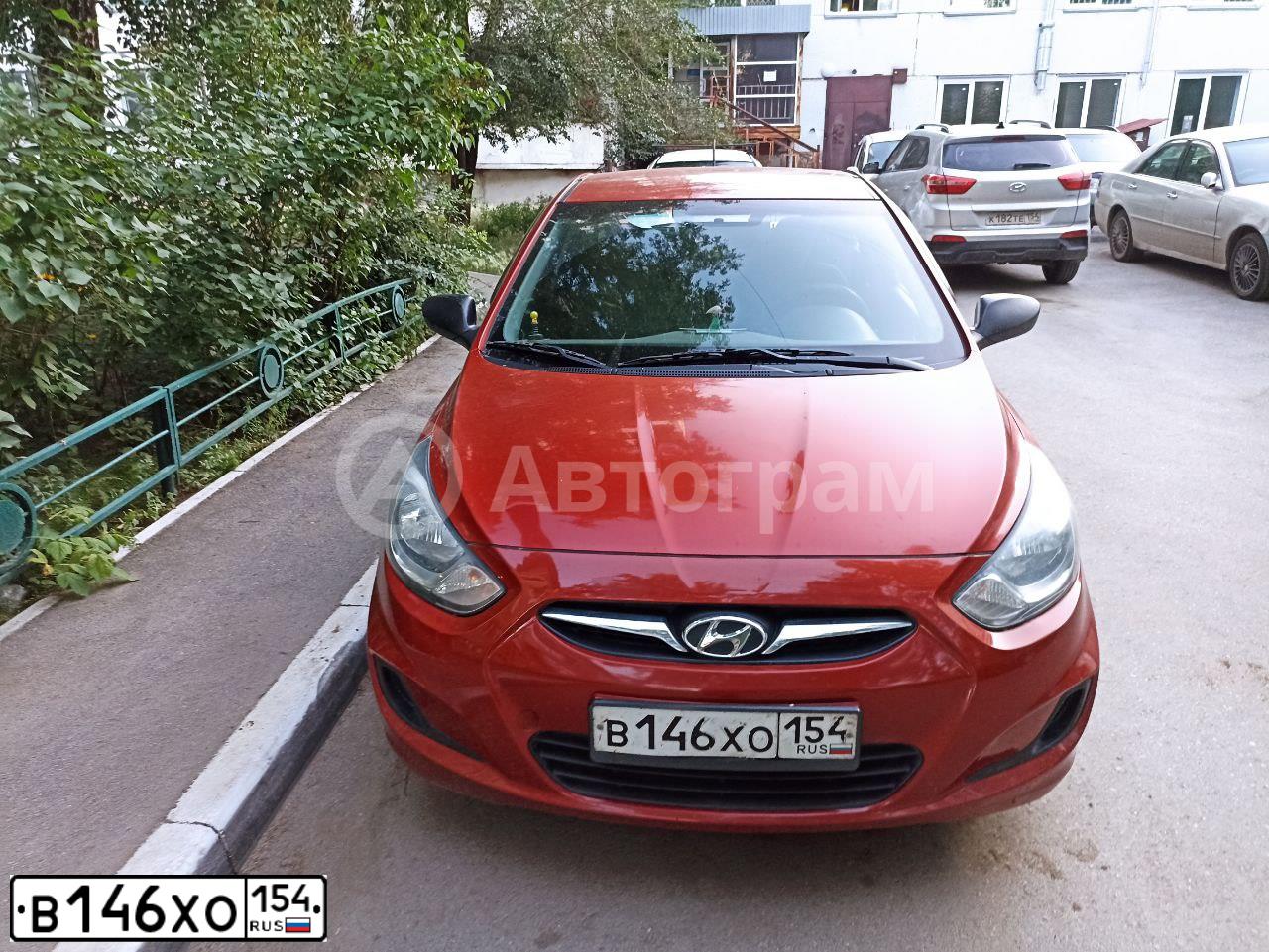 Фото автомобиля HYUNDAI SOLARIS, 2012 — госномер В146ХО154. Цвет: КРАСНЫЙ ГРАНАТ