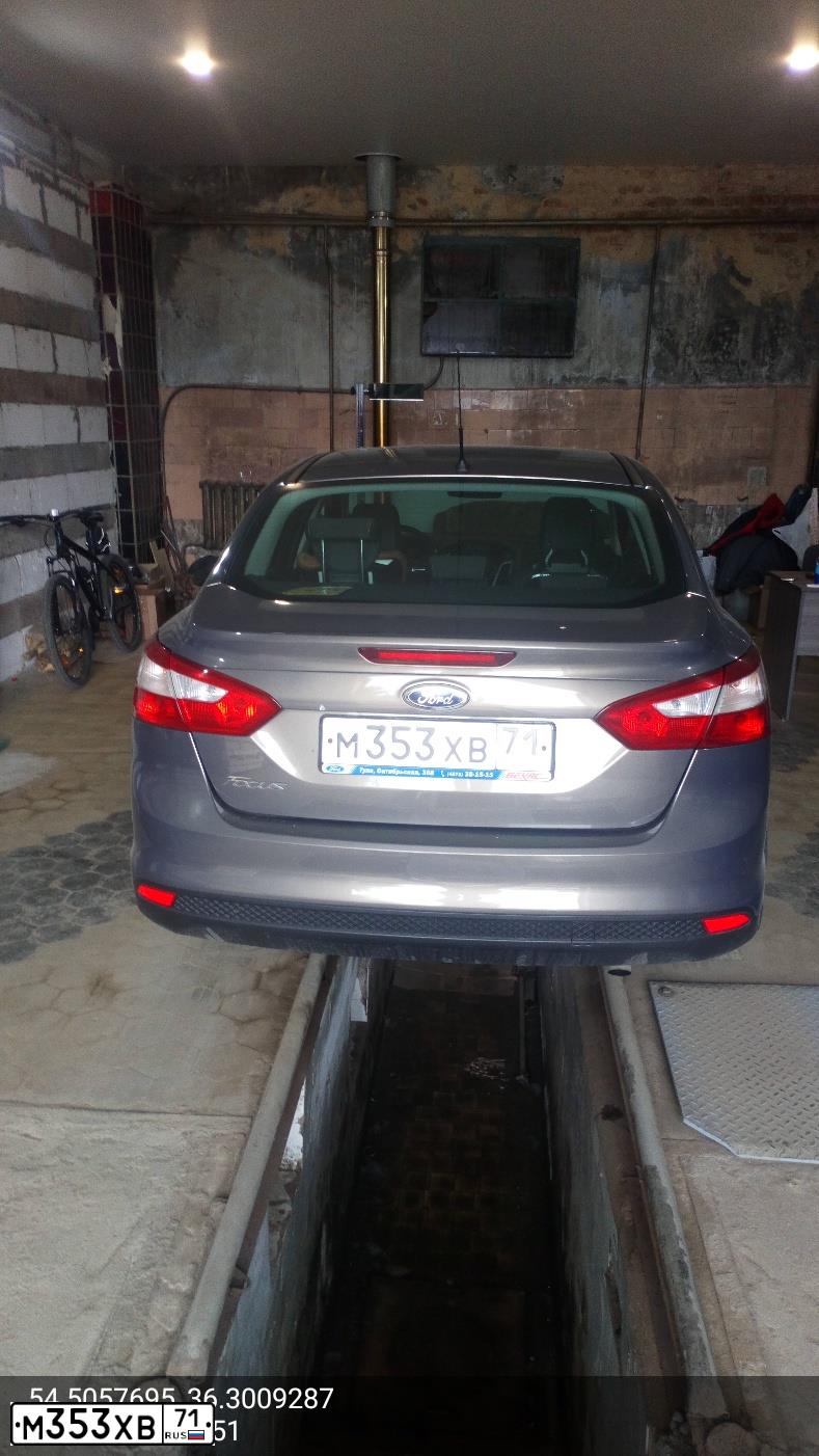 Фото автомобиля FORD FOCUS, 2011 — госномер М353ХВ71. Цвет: СЕРО-КОРИЧНЕВЫЙ