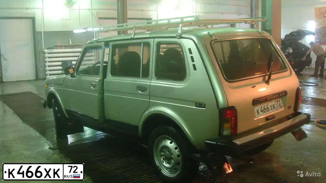 Фото автомобиля LADA NIVA, 2003 — госномер К466ХК72. Цвет: СВЕТЛО-ЗЕЛЕНЫЙ