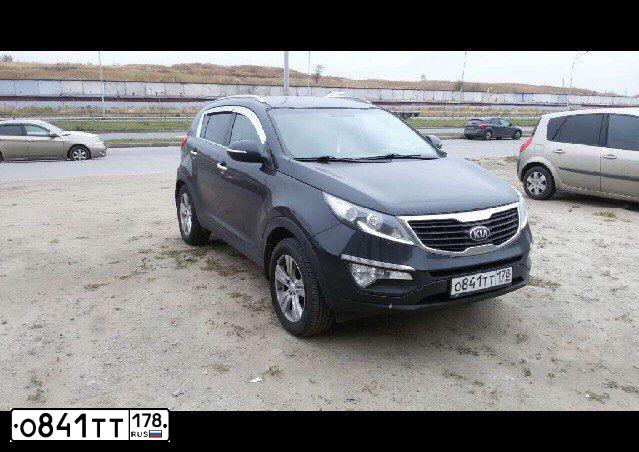 Фото автомобиля KIA SPORTAGE, 2013 — госномер О841ТТ178. Цвет: ЧЕРНЫЙ ПЕРЛАМУТР