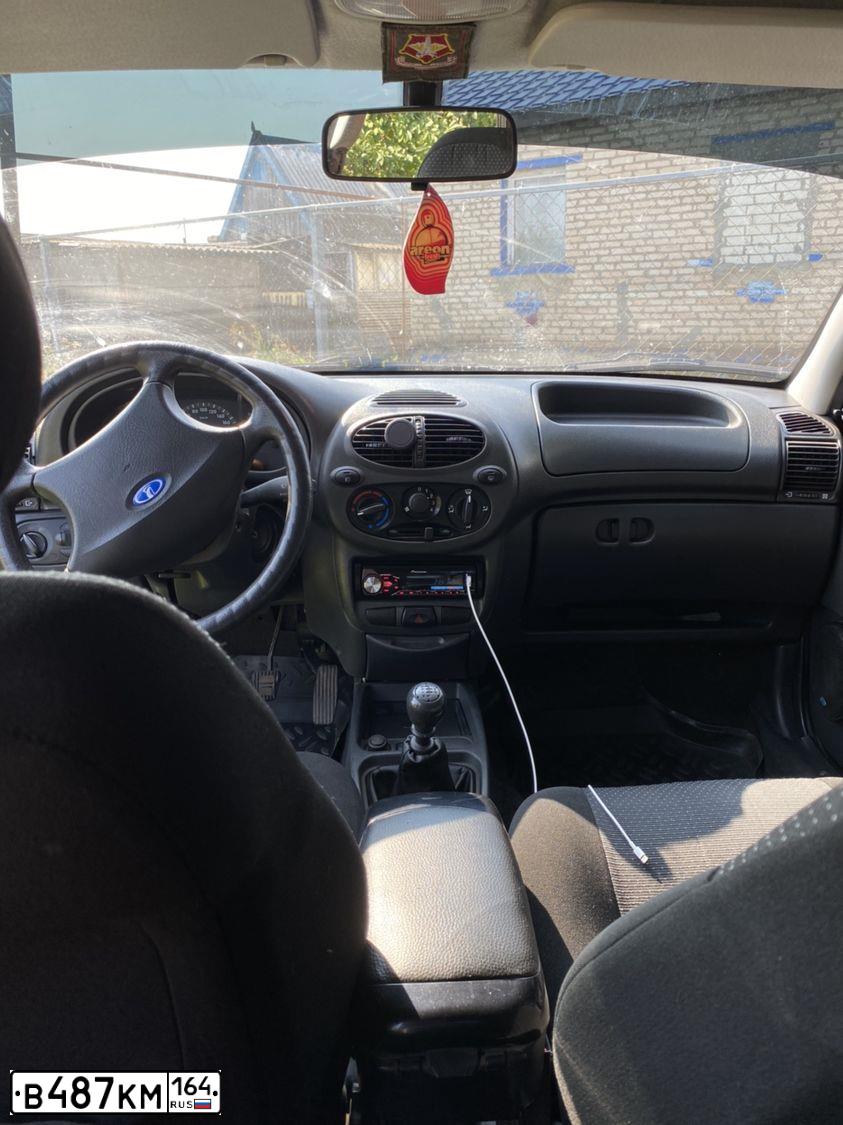 Фото автомобиля LADA 1119 KALINA, 2011 — госномер В487КМ164. Цвет: Темно-серый металлик