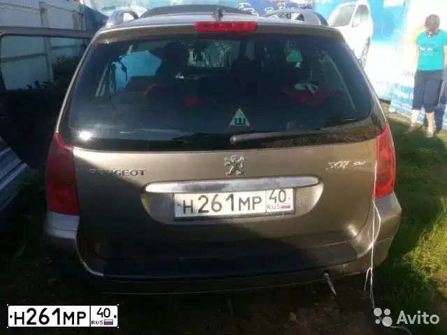 Фото автомобиля PEUGEOT 307, 2004 — госномер О224КК40. Цвет: Серый