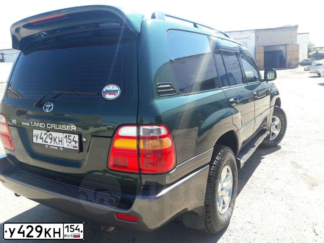 Фото автомобиля TOYOTA LANDCRUISER, 1998 — госномер Е135КН122. Цвет: ЗЕЛЕНЫЙ
