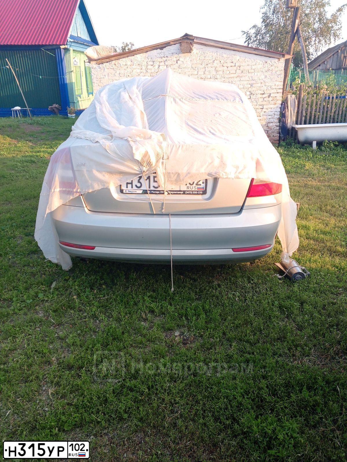 Фото автомобиля SKODA OCTAVIA, 2012 — госномер Н315УР102. Цвет: СЕРЕБРИСТО-ЖЕЛТЫЙ
