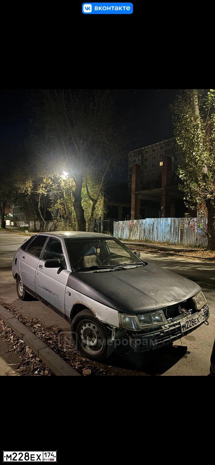 Фото автомобиля LADA 2112, 2002 — госномер М228ЕХ174. Цвет: ТЕМНО-ЗЕЛЕНЫЙ